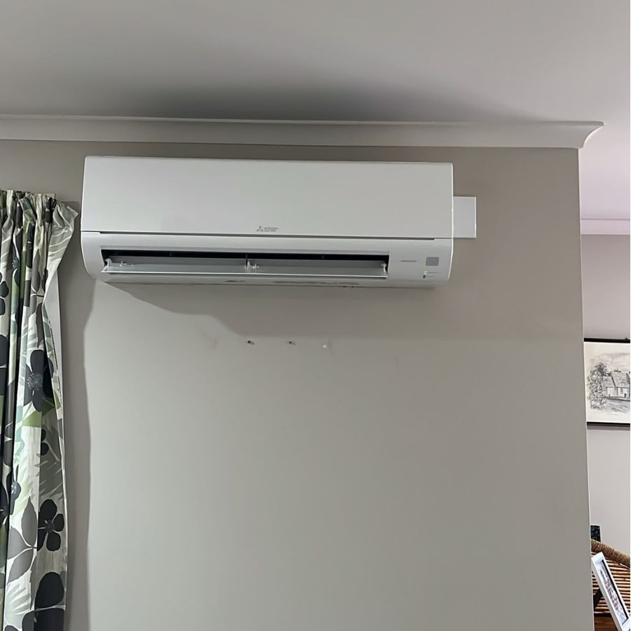 Air conditioning unit cooling a Palmerston North living room in summer