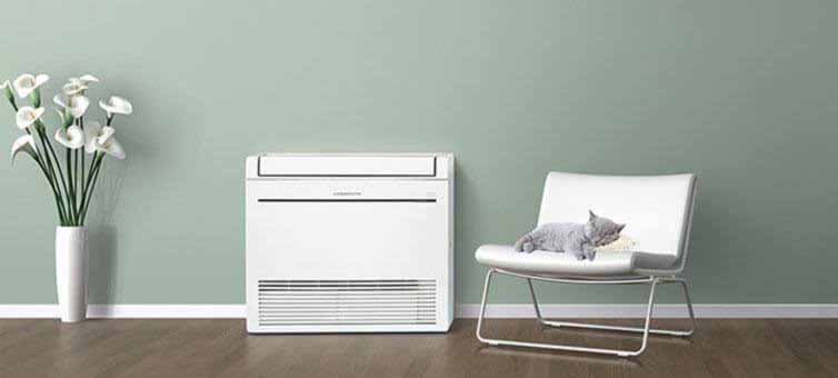 Floor console heat pump mounted low on a lounge wall in a Palmerston North home